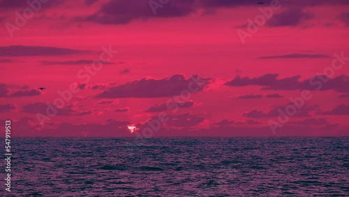 Popular background in cyberpunk red. Beautiful light motion blur, yellow Sunset or sunrise colorful Dramatic scenery Sky with amazing clouds in sunset sky, red pink light