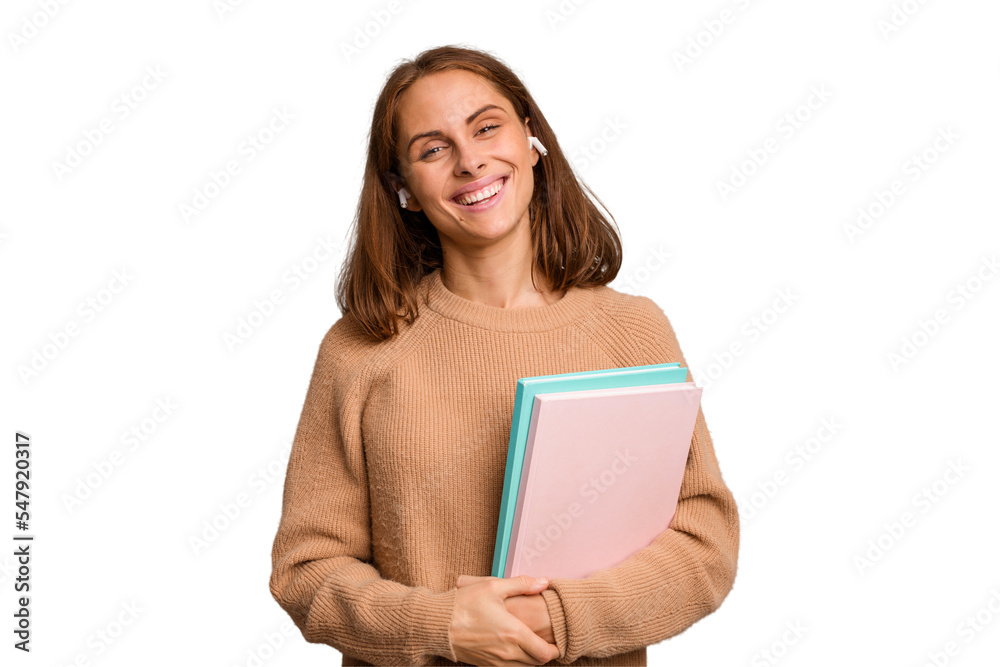 Young student woman holding a books isolated happy, smiling and cheerful. - obrazy, fototapety, plakaty 