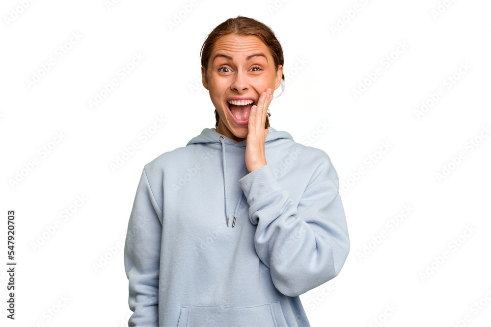 Young caucasian woman isolated shouts loud, keeps eyes opened and hands tense. Young caucasian woman isolated shouts loud, keeps eyes opened and hands tense.
