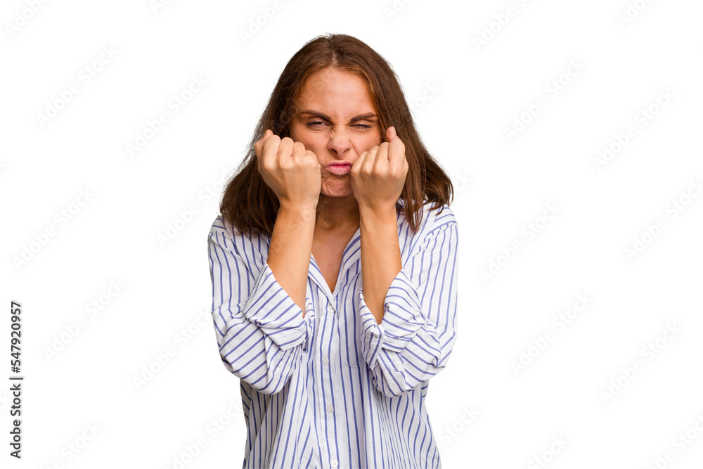 Young caucasian woman isolated showing fist to camera, aggressive facial expression. Young caucasian woman isolated showing fist to camera, aggressive facial expression.