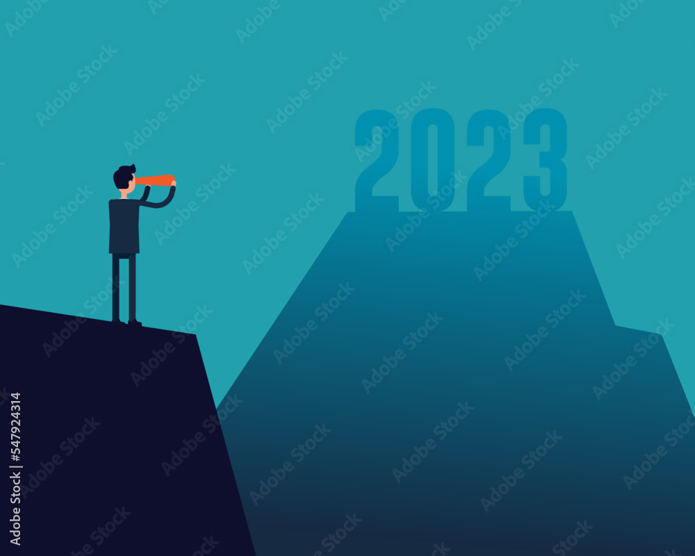Fototapeta premium Businessman looking at the fuzziness of the year 2023 through telescope