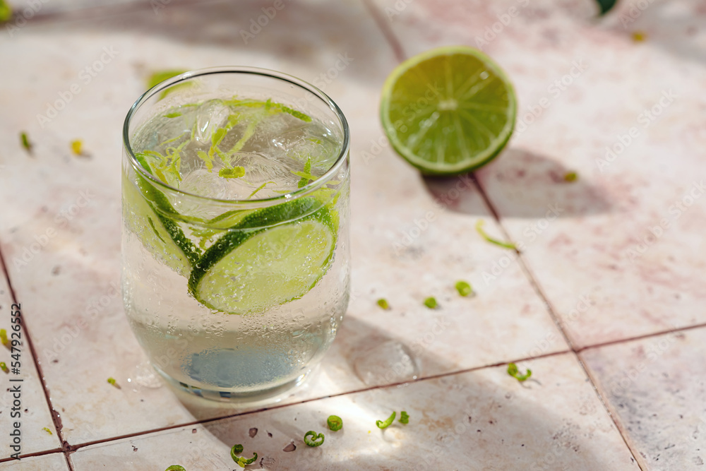 Tasty refreshing drink with lime, ice and sparkling water Tasty refreshing drink with lime, ice and sparkling water