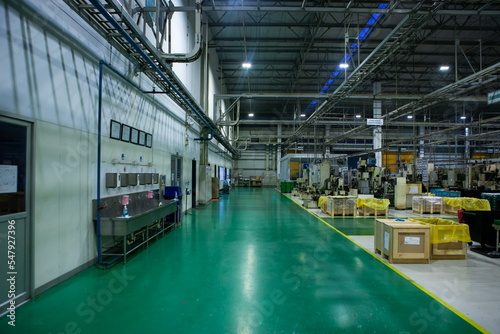 The warehouse for keeping material and finished goods of automotive parts for cars and tractors in Thailand. Manufacturing storage.