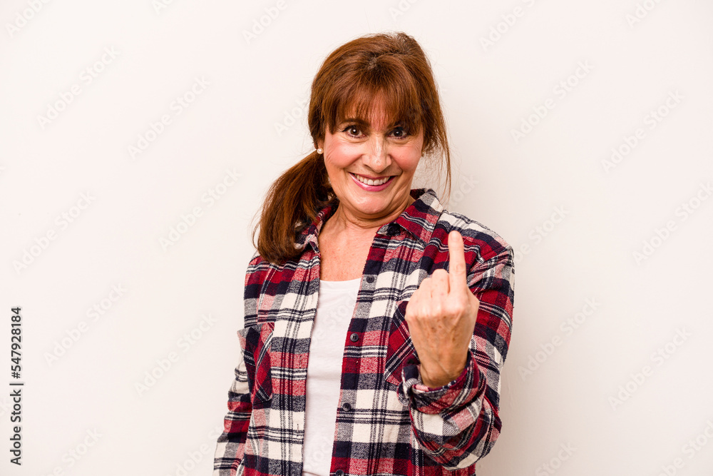 Middle age caucasian woman isolated on white background pointing with finger at you as if inviting come closer. Middle age caucasian woman isolated on white background pointing with finger at you as if inviting come closer.