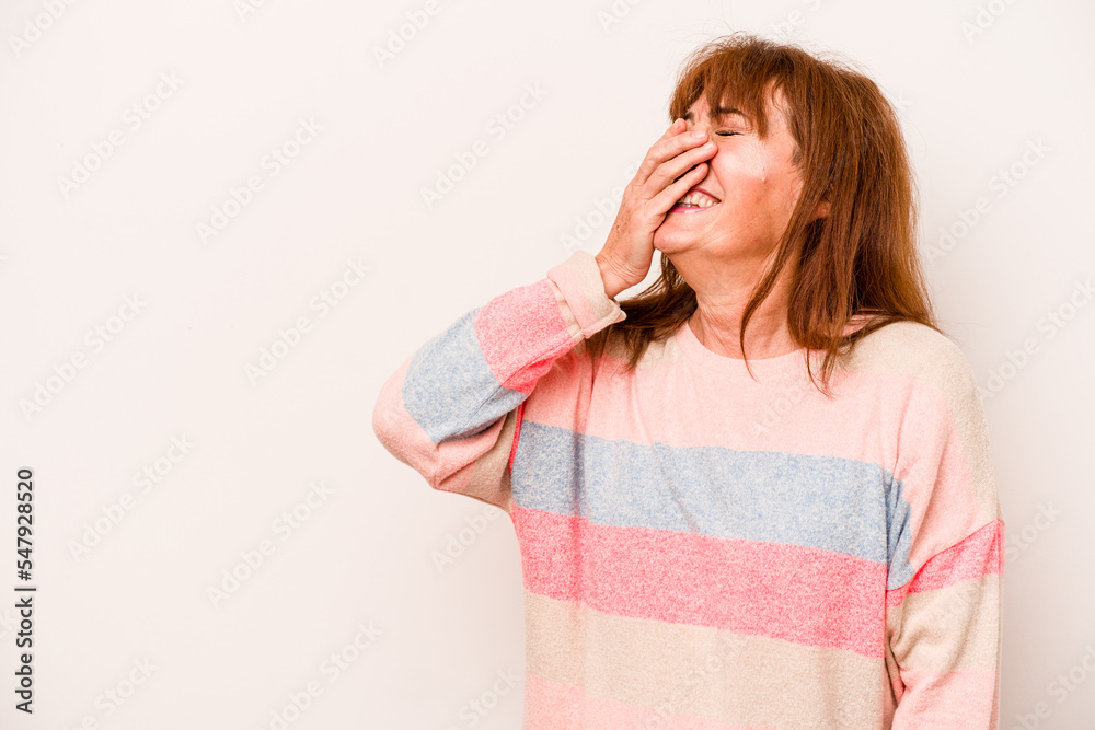 Middle age caucasian woman isolated on white background laughing happy, carefree, natural emotion. Middle age caucasian woman isolated on white background laughing happy, carefree, natural emotion.