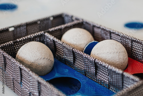 detail of some fronton balls inside a box. basque pelota. horizontal format. concept sports in basque country. spain. photo