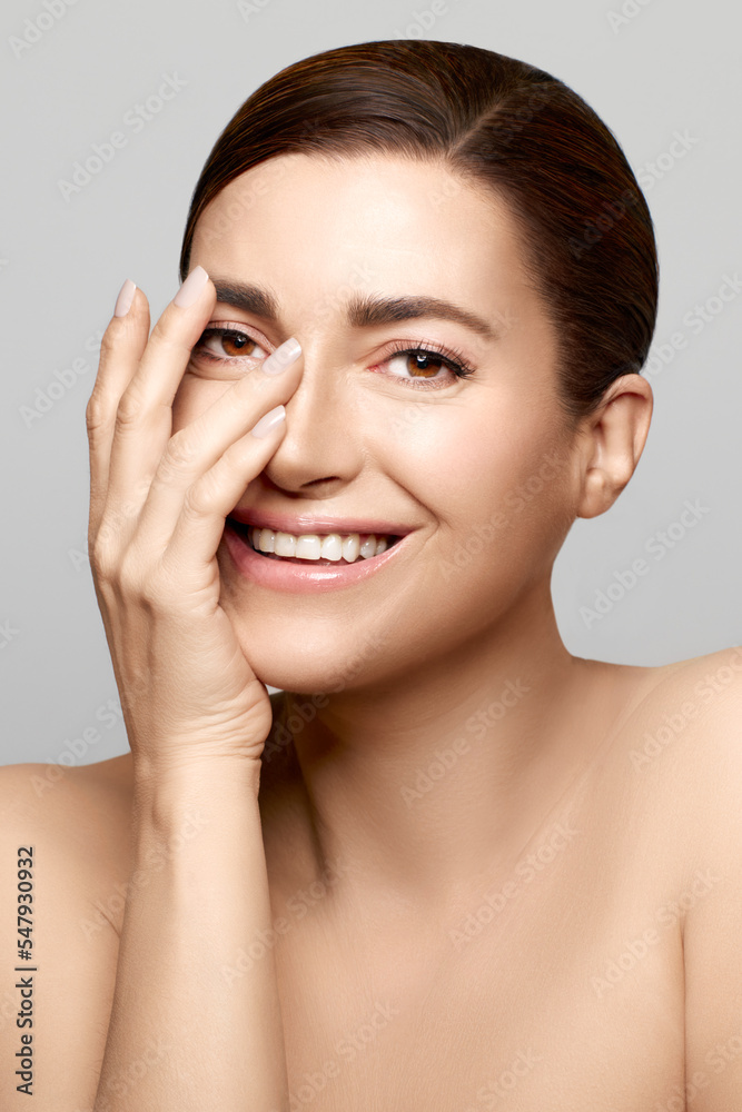 Closeup woman face with smiling expression. Skin Care, Spa and Beauty Concept Closeup woman face with smiling expression. Skin Care, Spa and Beauty Concept
