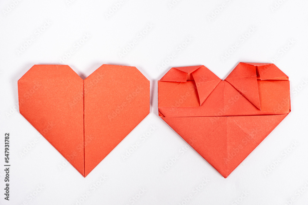 Obraz premium Origami for Valentine's Day - heart made of paper on a white background do it yourself