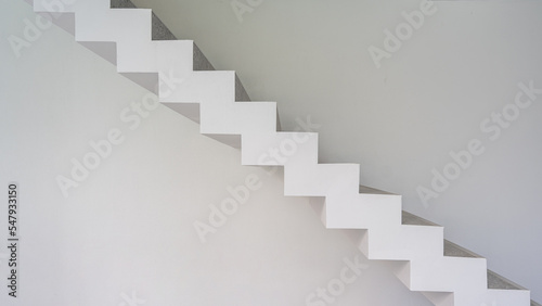 Modern stairway with white cement structure with white color wall building architecture interior design contemporary.