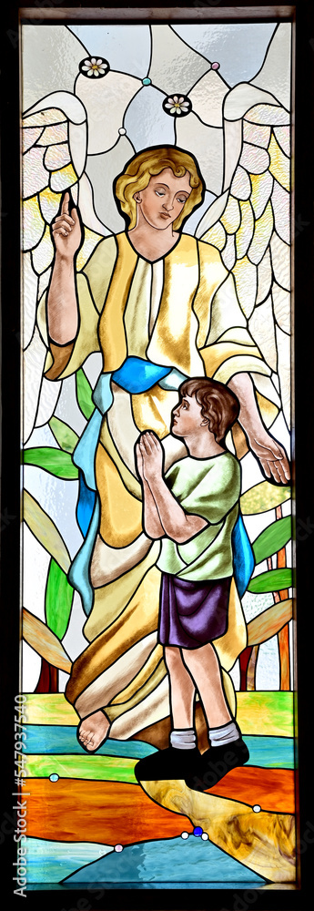 BANGKOK, THAILAND - November 21, 2022 : Colorful stained glass windows in Chapel of Annunciation, Thailand. Concept art painting on stained glass.