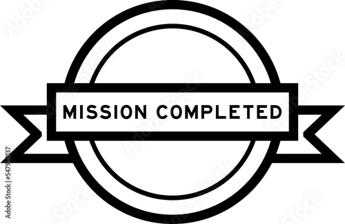 Vintage black color round label banner with word mission completed on white background