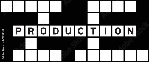 Alphabet letter in word production on crossword puzzle background