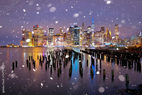 New York City downtown waterfront evening snow view, famous skyline