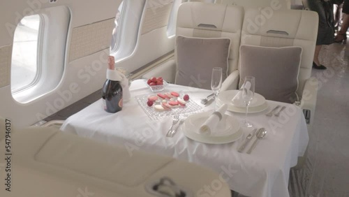 private jet interior with laid table