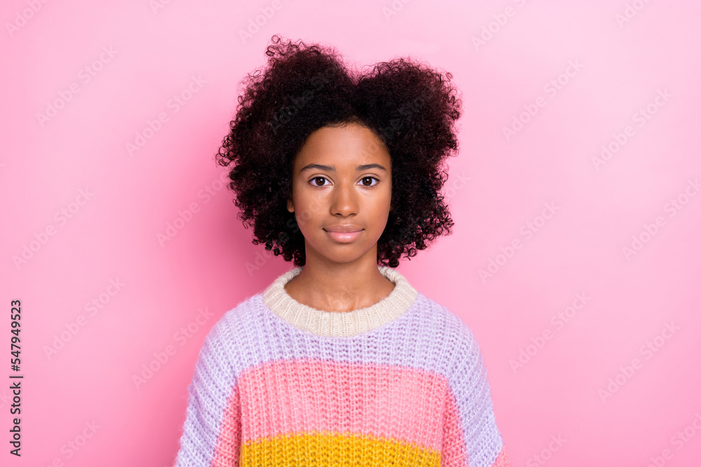 Photo of satisfied optimistic pleasant girl with perming coiffure wear knit sweater look at camera isolated on pink color background Photo of satisfied optimistic pleasant girl with perming coiffure wear knit sweater look at camera isolated on pink color background