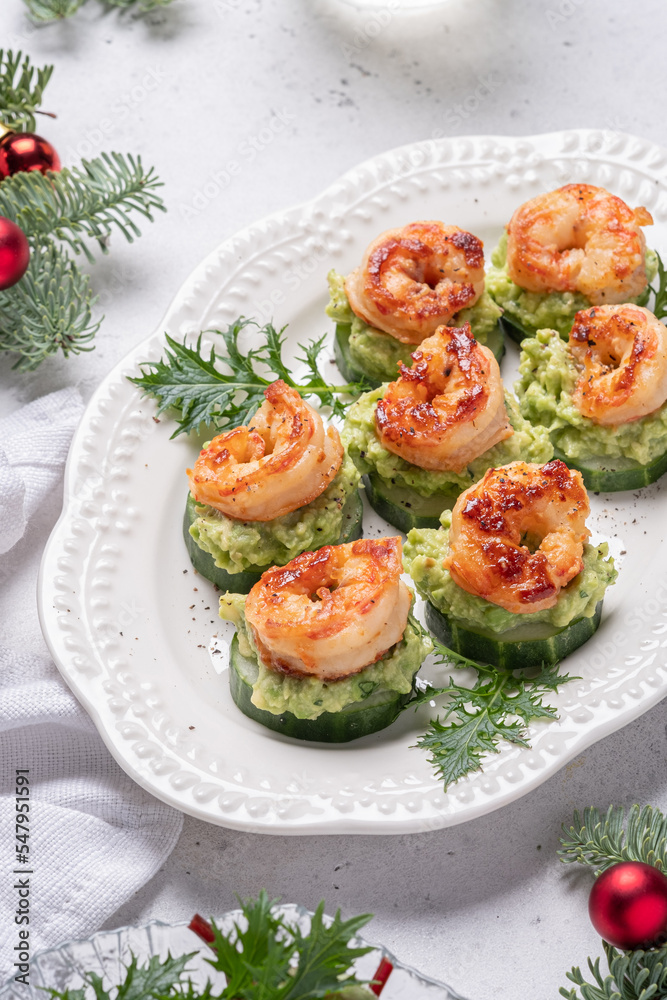Cucumber Avocado Shrimp Appetizer. Canape with prawn, cucumber and guacamole, party food, finger food Cucumber Avocado Shrimp Appetizer. Canape with prawn, cucumber and guacamole, party food, finger food