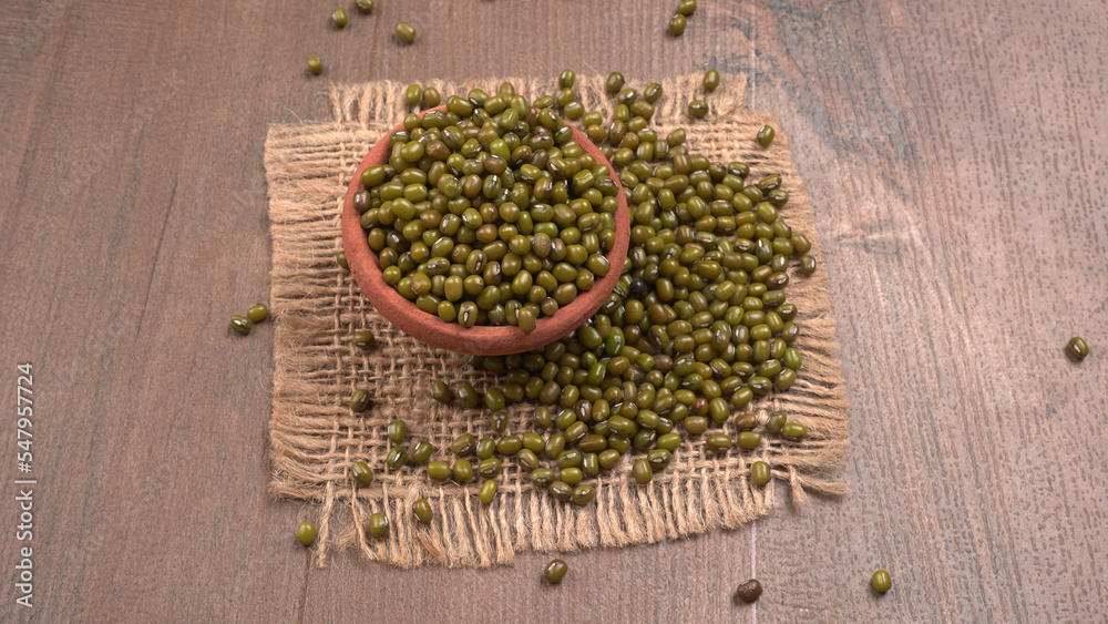 Fototapeta premium Green Mung Beans Also Know as Mung Dal, Vigna Radiata, Green Beans or Moong Dal isolated on White Background