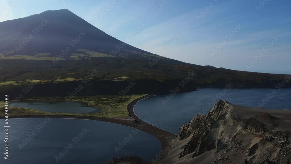 Aerial view of the isthmus between volcano Taketomi and Atlasova island Aerial view of the isthmus between volcano Taketomi and Atlasova island