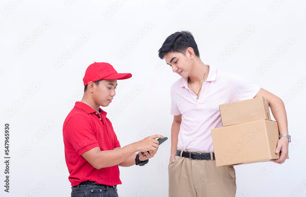 A courier showing computed delivery charges to a customer. Cash on delivery parcel concept. Isolated on a white background. A courier showing computed delivery charges to a customer. Cash on delivery parcel concept. Isolated on a white background.