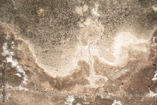 Fondo de una pared vieja de cemento desgastado por la humedad 