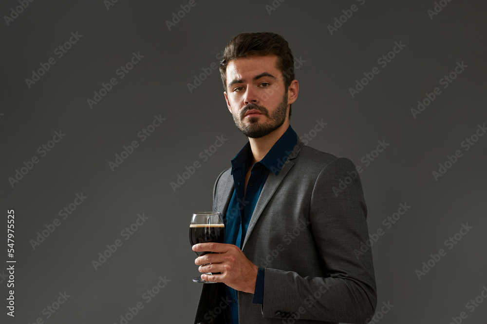 Confident caucasian brewer with glass of beer Confident caucasian brewer with glass of beer