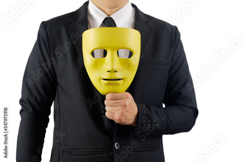 Businessman holds the mask in hand