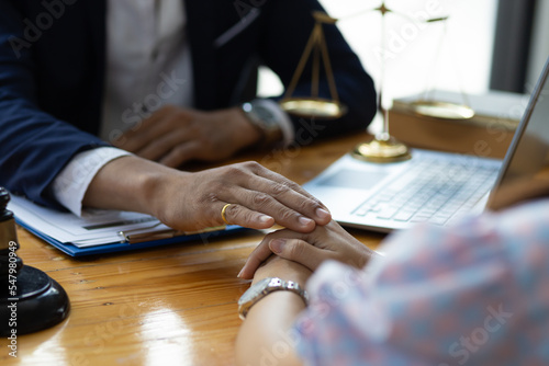 Φωτογραφία Lawyer meeting and consoling solution to his client provide legal advice and trust commitment strain serious for problem