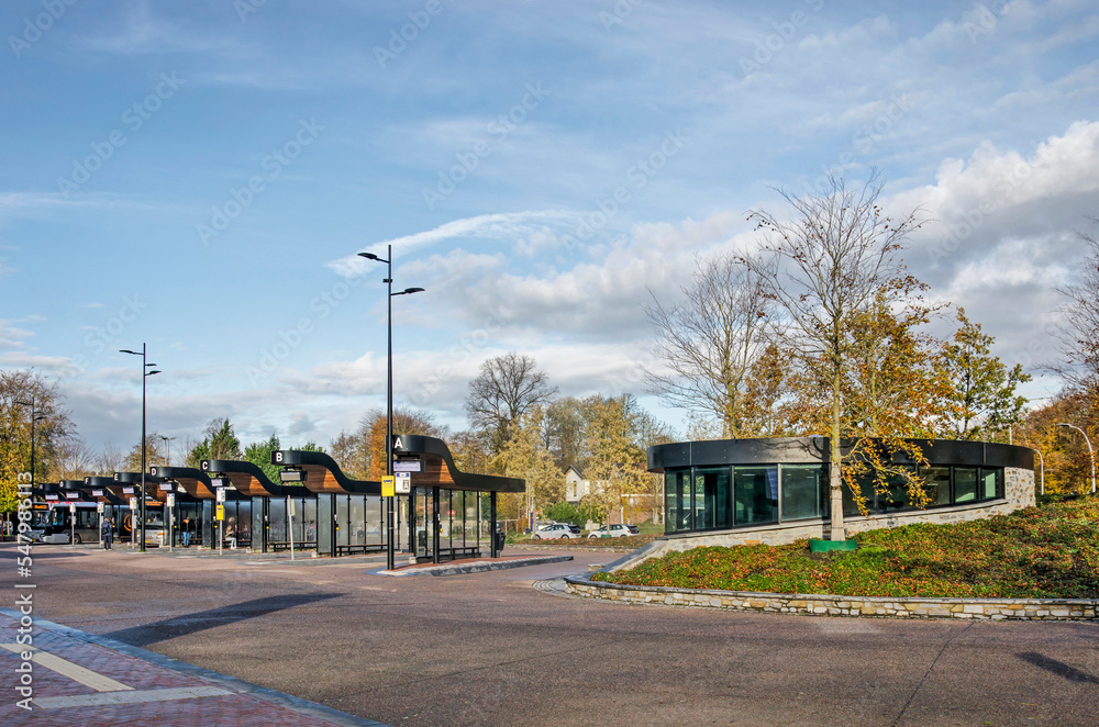 Driebergen, The Netherlands, November 18, 2022: bus station next to Driebergen-Zeist railway station on a sunny day in autumn