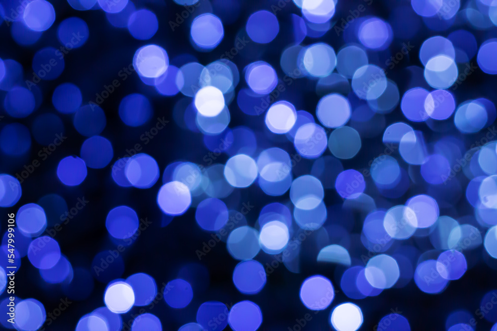 Abstract blue bokeh snow lights background