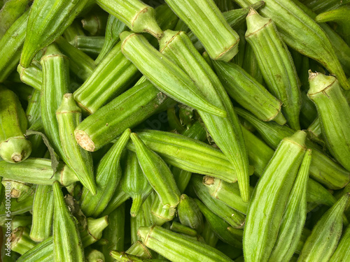Fresh green okra, close up view of okra, healthy food, background