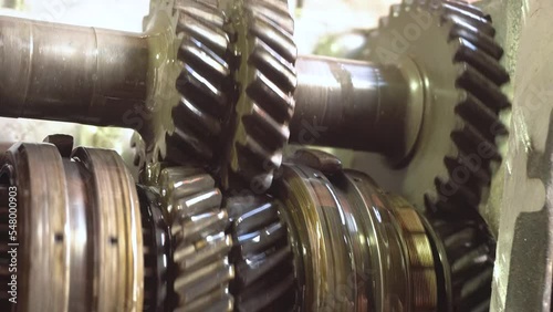 Close-up of a car gearbox. working gears of a complex mechanism. Inside the car gearbox