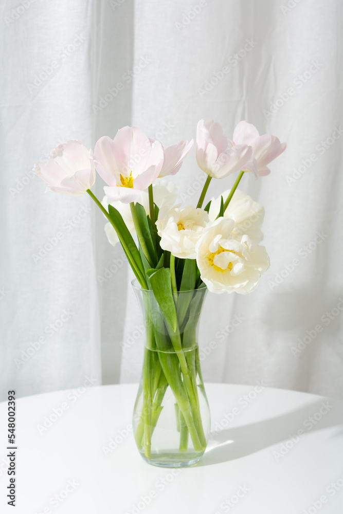 Light spring flowers in vase on table Light spring flowers in vase on table