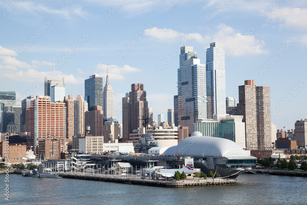 Naklejka premium New York City Skyline And A Navy Ship