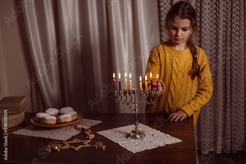 family celebration of the Jewish holiday Hanukkah  at home photo