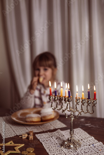 family celebration of the Jewish holiday Hanukkah  at home photo