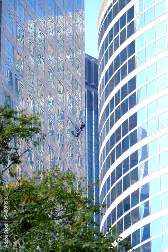 window washers in the downtown skyline photo