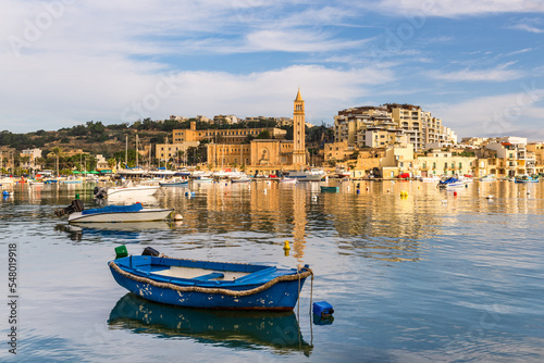 Marsaskala fisherman village in Malta. Waterfront with colorful boats