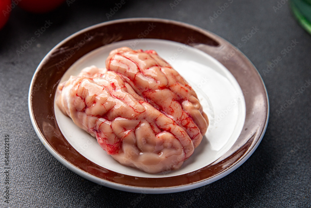 brain pork offal raw meat delicious snack mortadella, pistachios, ham healthy meal food snack diet on the table copy space food background rustic top view brain pork offal raw meat delicious snack mortadella, pistachios, ham healthy meal food snack diet on the table copy space food background rustic top view