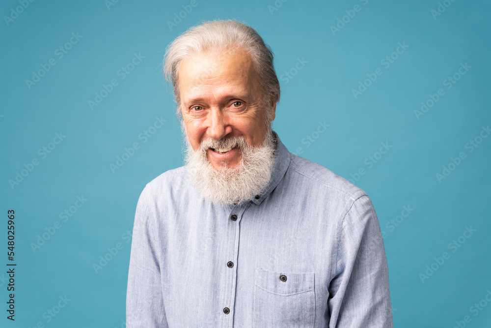 Retired old man with white hair and beard open mouth shiny smile