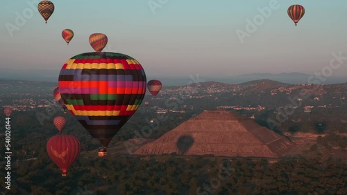 Colorful Hot Air Balloons float over the Pyramid of the Sun in Teotihuacan, Mexico photo