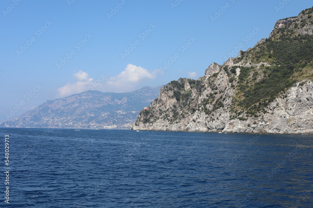 view of the sea and mountains. view of the coast of island. coast of the region. landscape with mountains and sea. landscape with blue sky and clouds. sea and rocks