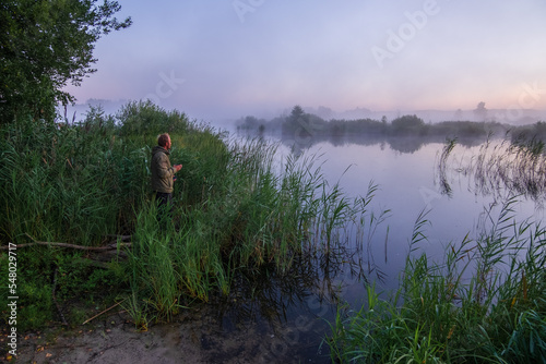 person on the morning lake  © Александр Арендарь