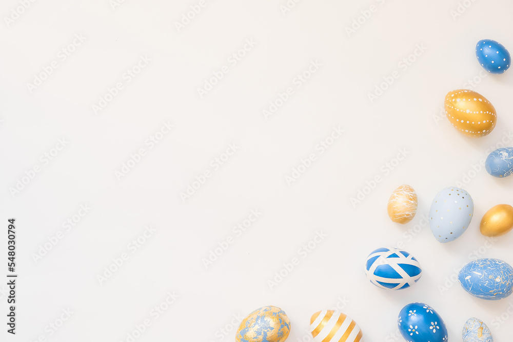 Frame of Easter decorated eggs isolated on white background. Minimal easter concept. Happy Easter card with copy space for text. Top view, flatlay.