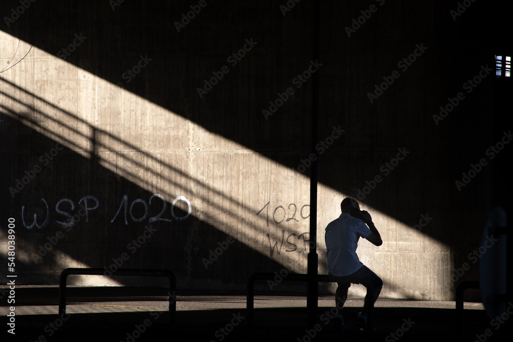 silhouette of a person in the street
