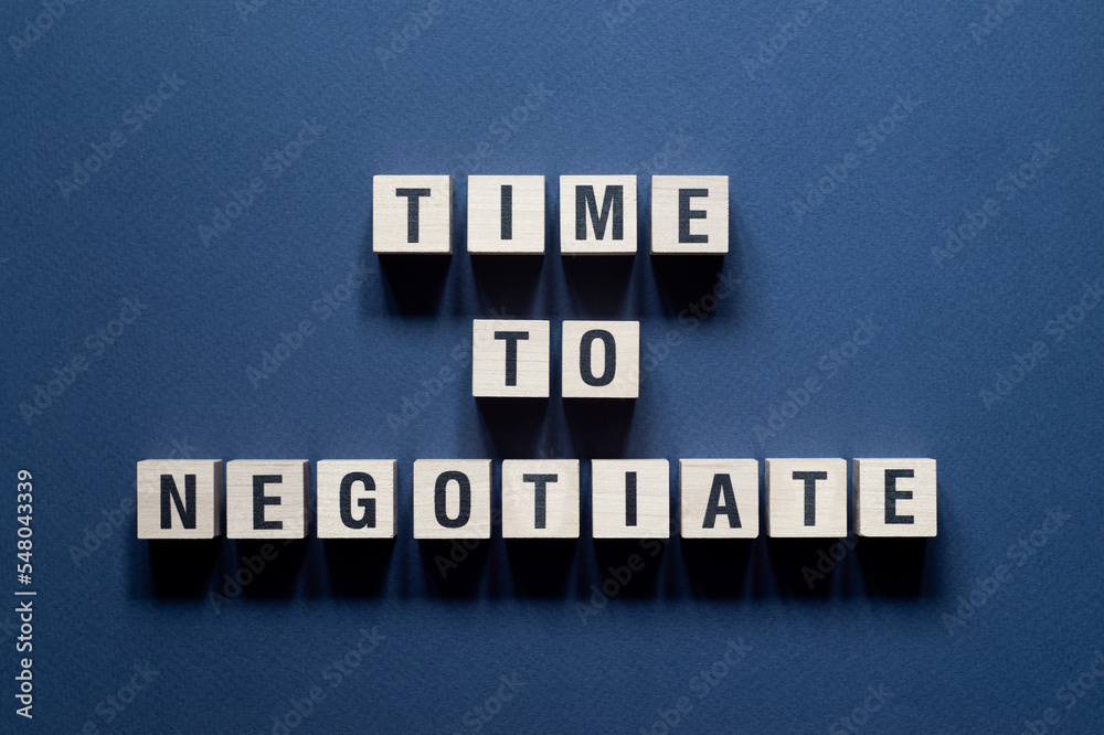 Time to negotiate - word concept on cubes Time to negotiate - word concept on cubes