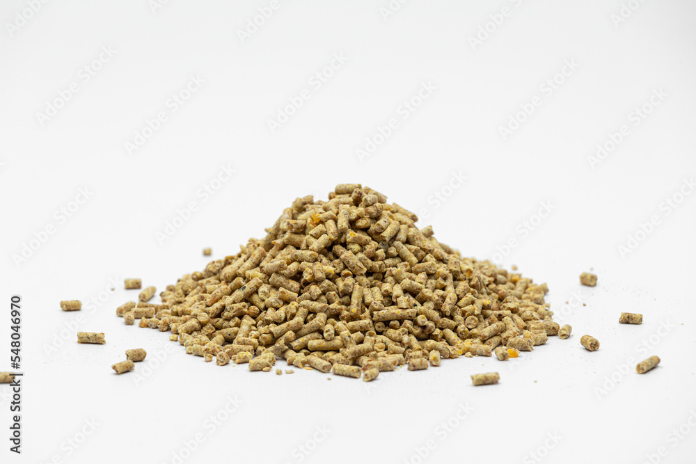 Fraction of feed additives for animals on a white background in the form of a pyramid