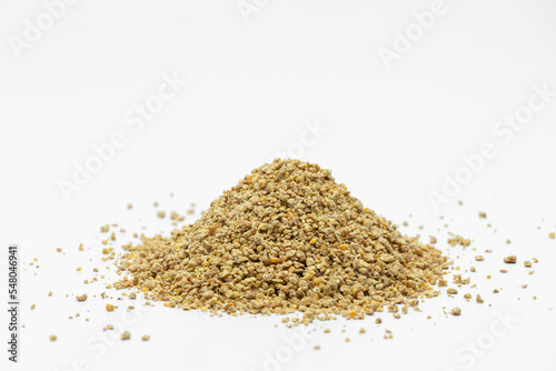 Fraction of feed additives for animals on a white background in the form of a pyramid