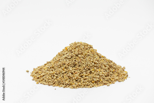 Fraction of feed additives for animals on a white background in the form of a pyramid