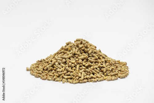 Fraction of feed additives for animals on a white background in the form of a pyramid