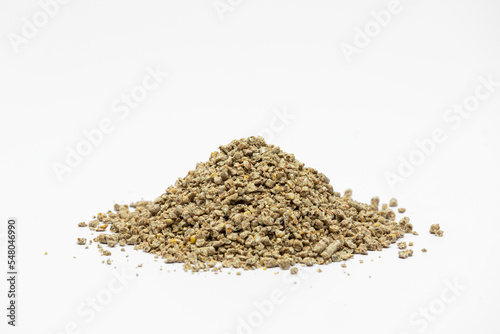 Fraction of feed additives for animals on a white background in the form of a pyramid